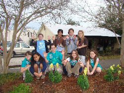 Junior Girl Scouts & Brownies help plant bulbs
