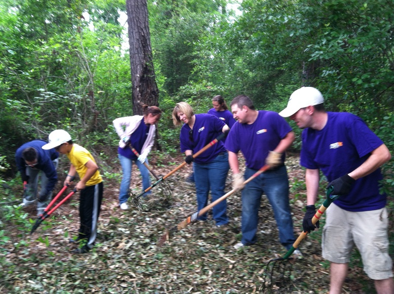 Volunteers mulch Nature Trail