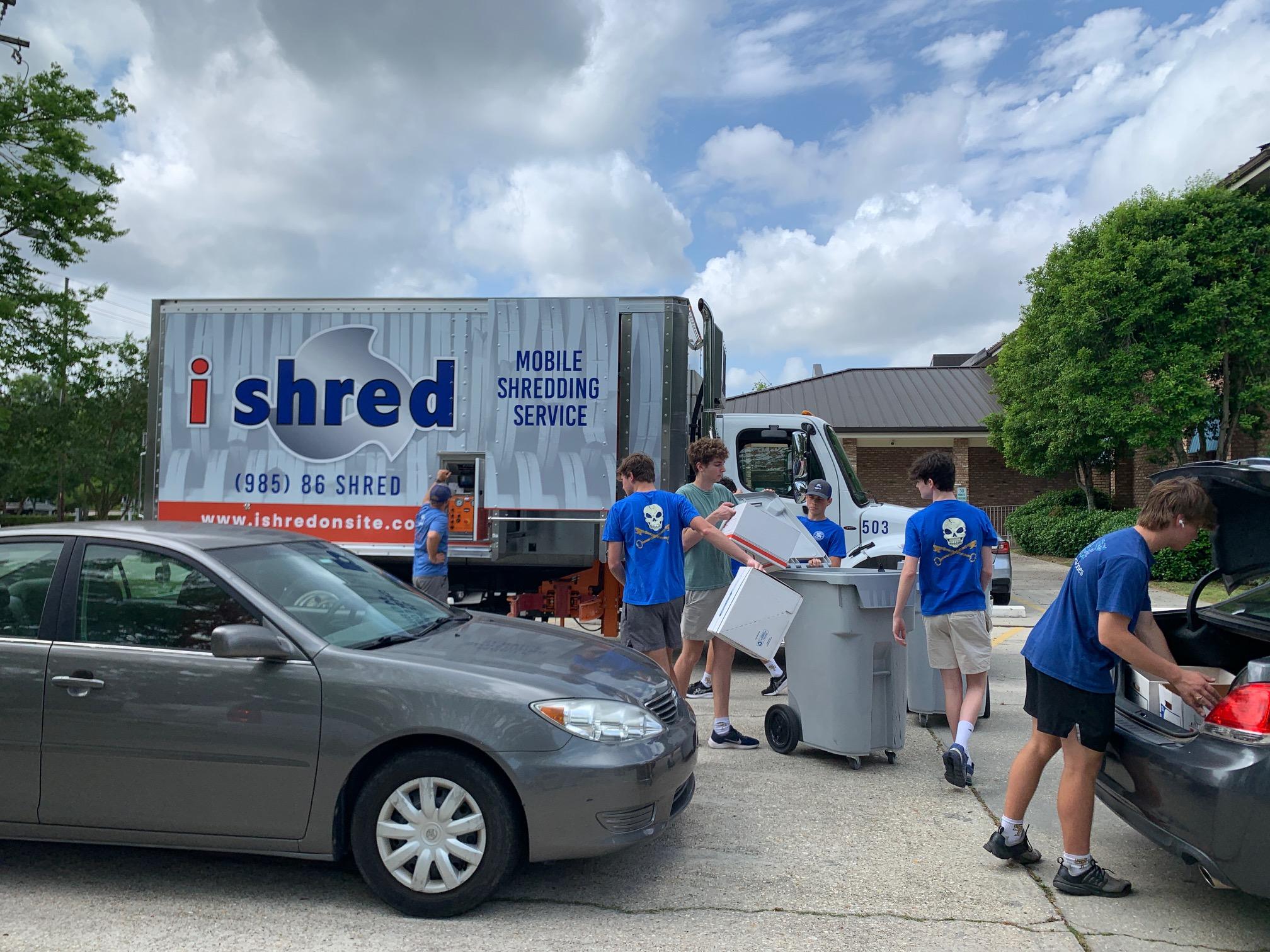 I-Shred Volunteers Unloading 2024